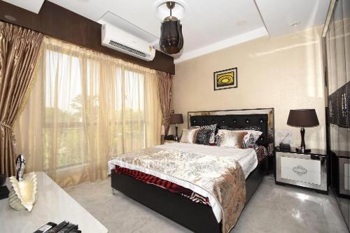 Service apartments in new town, Kolkata - Master Bedroom